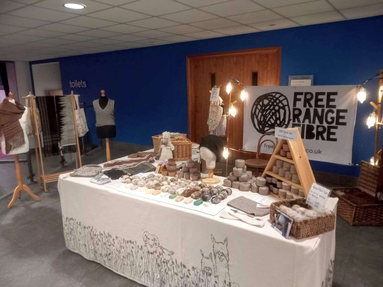 trade stand containing alpaca products from fre range fibre at the british alpaca society national show 2022