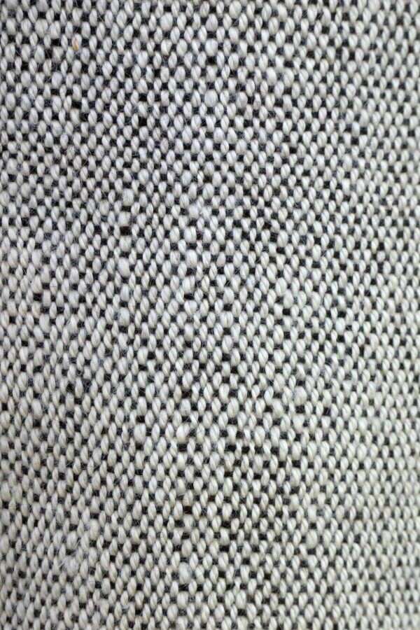 close up of alpaca scarf with white and black dots