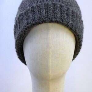dark grey shetland wool hat on a display head