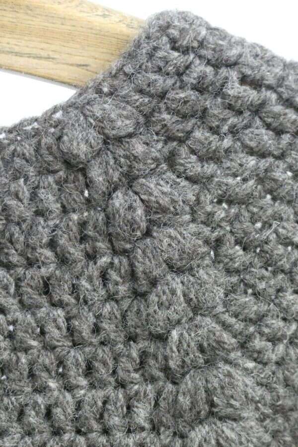 dark grey shetland wool jumper neckline close up