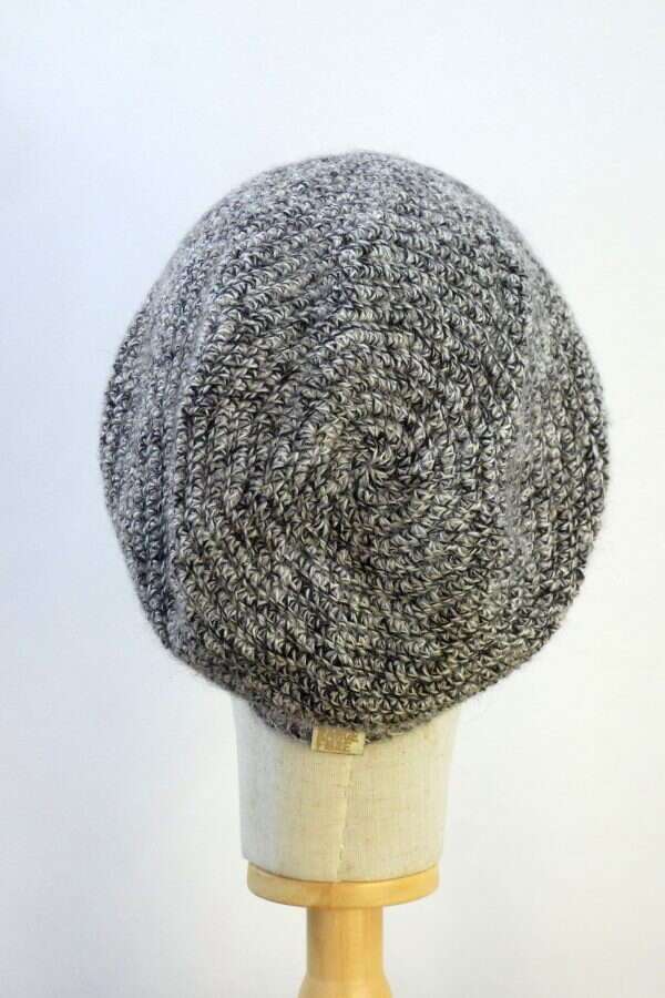 rear view of a mottled black and white slouchy beanie