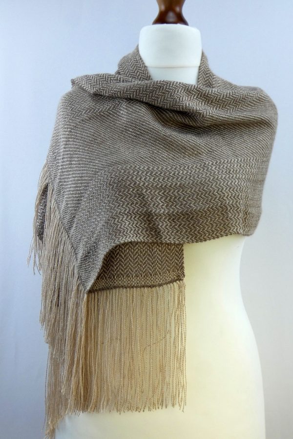 herringbone pattern woven shawl wrapped over tailors dummy