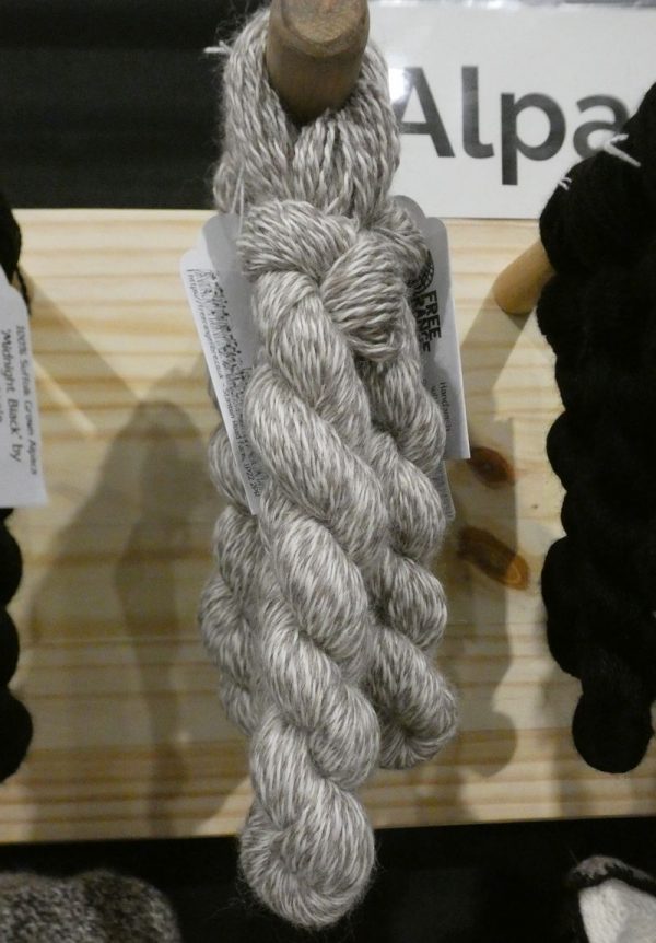 grey and white barber pole alpaca yarn skein