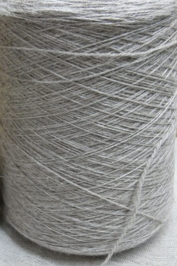 light grey laceweight shetland yarn on cone close up