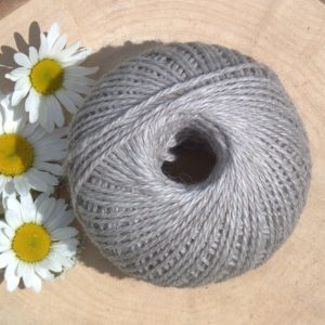 ball of alpaca yarn in a dove grey colour