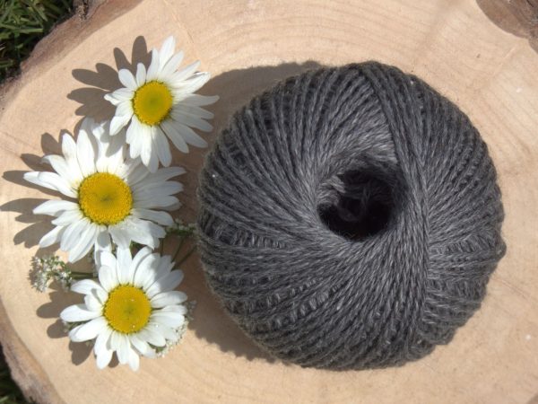 ball of alpaca yarn in a goose grey colour