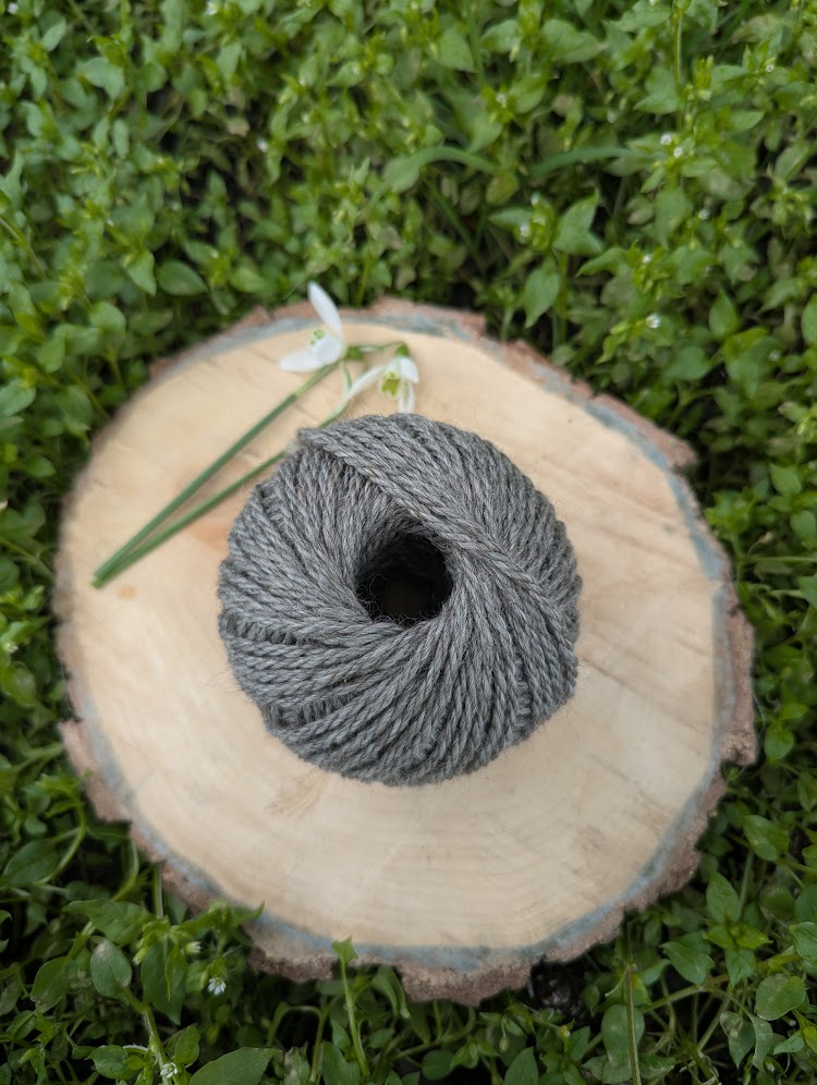 aran weight alpaca yarn in mid grey. 50g ball.