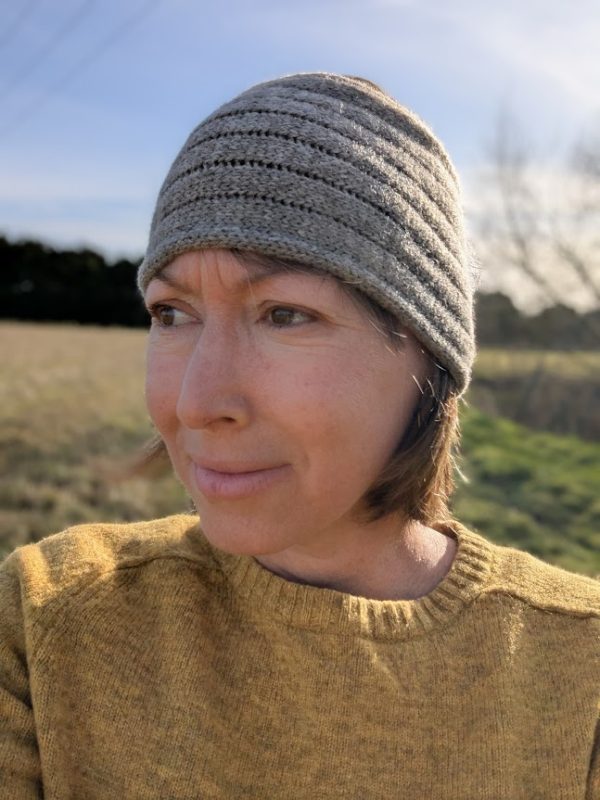 lady wearing mid grey shetland wool headband