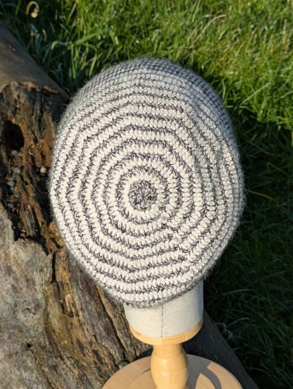 top view of alpaca sloch beanie in black and white stripes