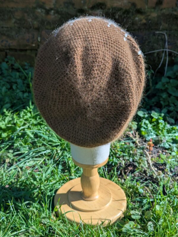 rear view of slouchy alpaca beanie in brown and white