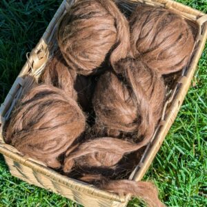 ball of wound suri alpaca sliver in gingernut brown