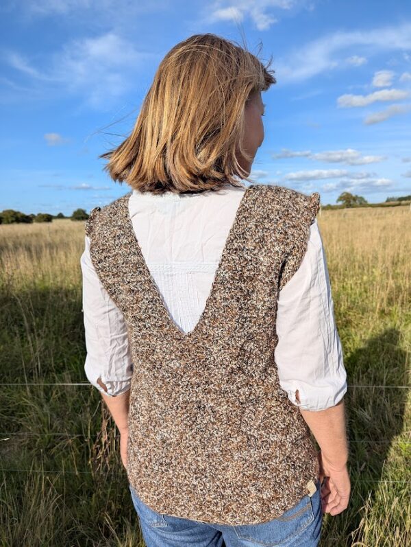 back of alpaca vest top in mottled browns