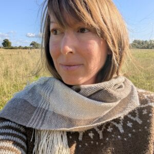 brown, cream, grey and white woven alpaca scarf