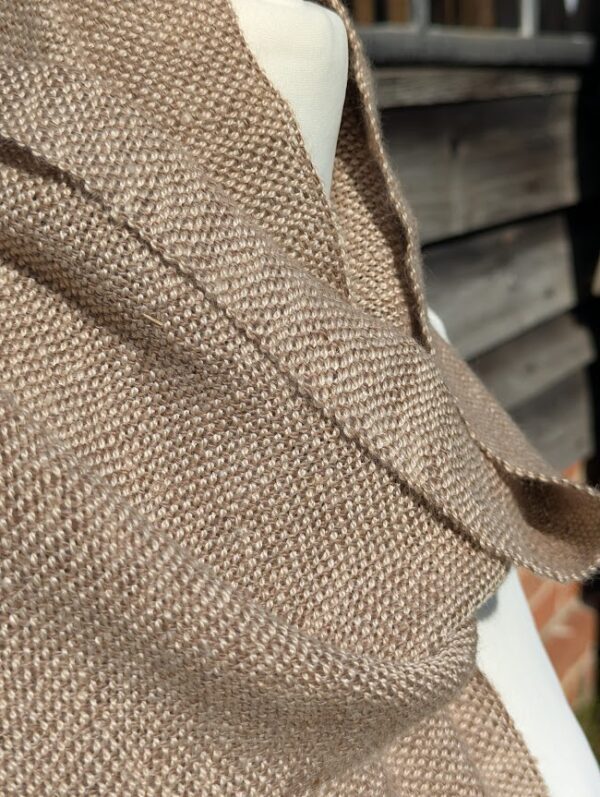 suri alpaca scarf in soft brown and cream close up