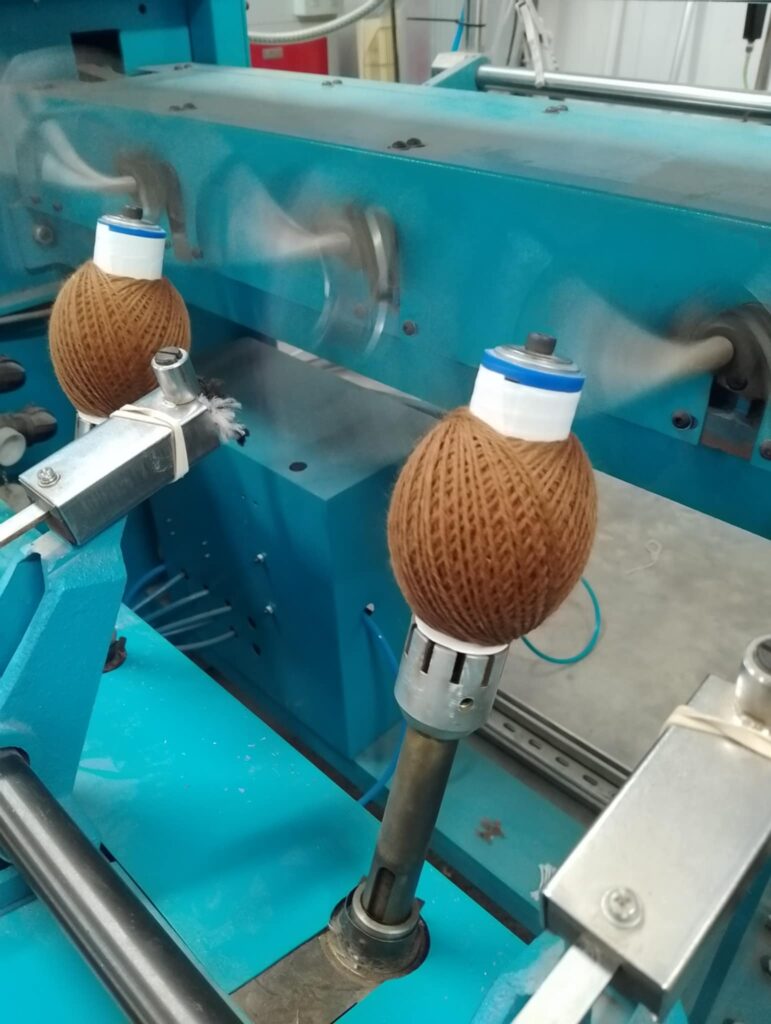 making 50g balls of alpaca yarn