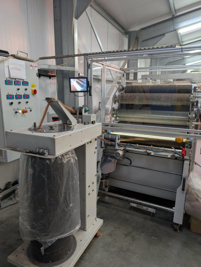 alpaca fibre coming out of the carding machine